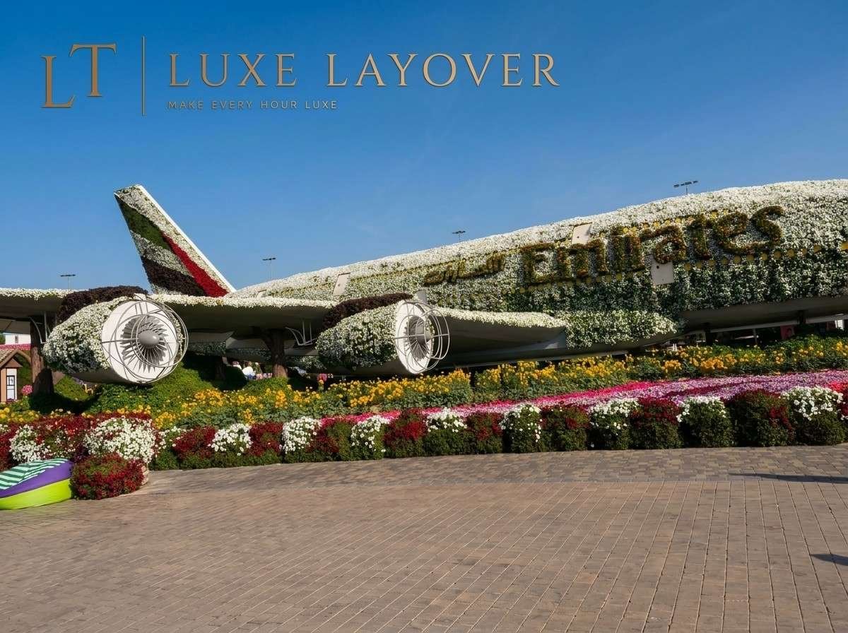 A life-size Emirates Airlines aircraft floral sculpture set among garden beds